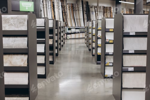 Preview: Interior of a home improvement store displaying rows of modern wallpaper samples