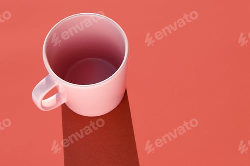Preview: Mug over a salmon color background. Morning breakfast. Design porcelain
