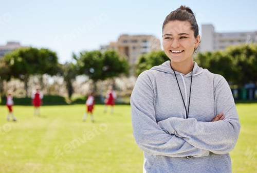 Preview: Sports, soccer and coaching with woman on football field with arms crossed for training, fitness or