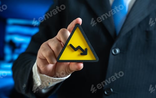 Preview: A symbol of falling income in the hands of a businessman. Crisis and financial problems