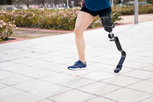 Preview: Close-up of Carbon Fiber Sports Prosthetic Leg of Running Athlete