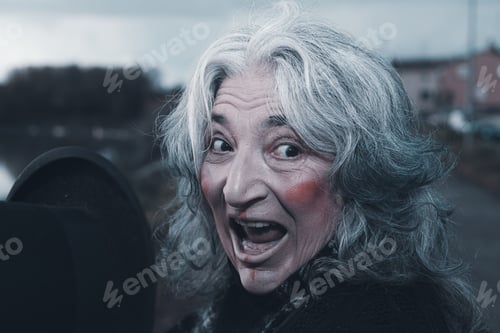 Preview: portrait of female dark evil character outdoors a cloudy sad day - evil concept