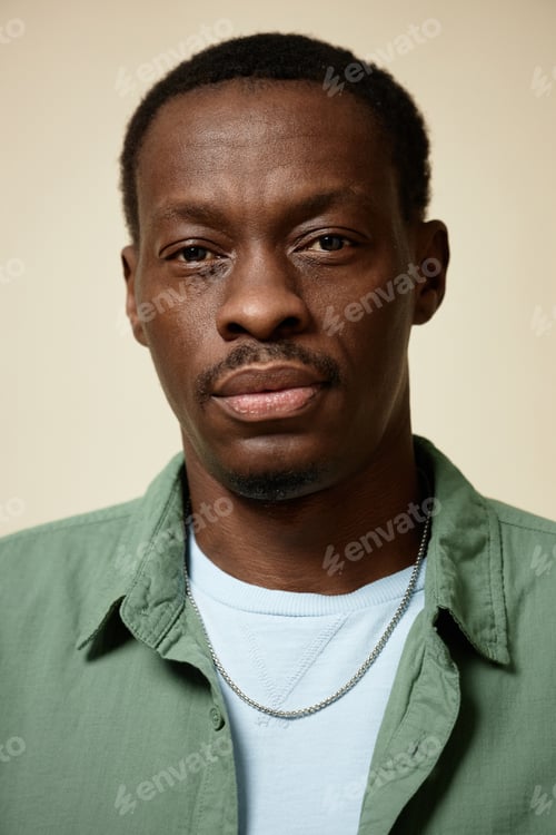 Preview: Vertical front view portrait of adult African American man