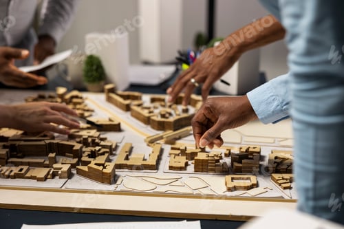 Preview: Team of real estate developers planning modern residential project