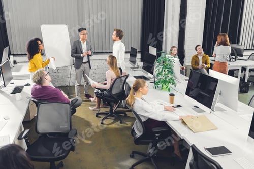 Preview: professional young multiracial businesspeople working together in open space office