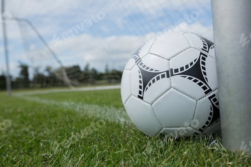 Preview: Soccer ball near a goal post