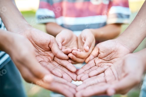 Preview: Cropped shot of a group of children with their hands cupped outdoors