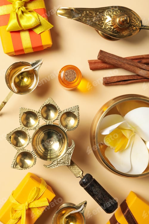 Preview: Copper utensils, spices and gift boxes on beige background, top view
