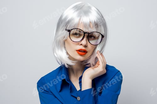 Preview: elegant woman in white wig red lips glasses glamor blue shirt close-up