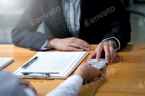 Preview: Business Meeting with Money and Contract Agreement