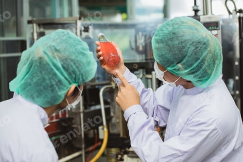 Preview: Quality control and food safety staff team inspection products contaminate standard in drink factory