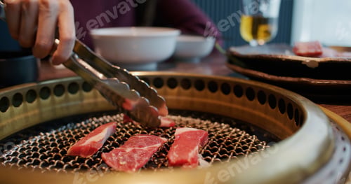 Preview: Fresh slice of beef grilled on the stove in restaurant