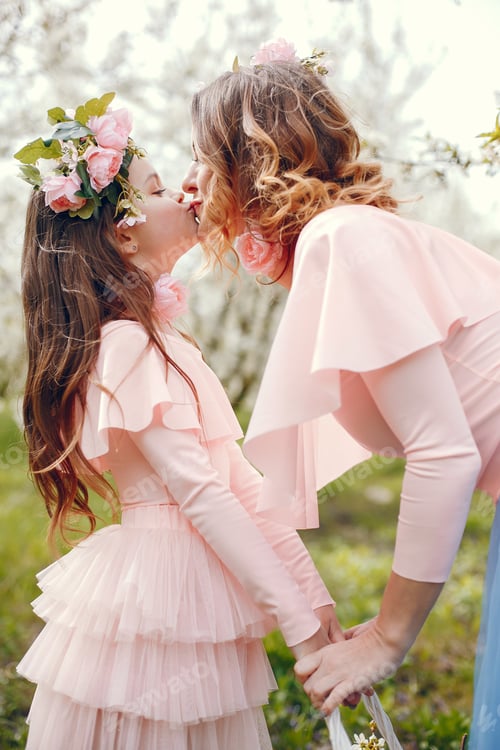Preview: Cute and stylish family in a spring park
