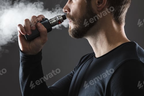 Preview: Vaping flavored e-liquid from an electronic cigarette