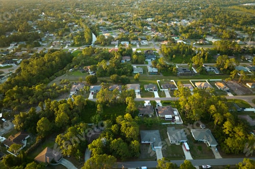 Preview: Aerial view of suburban landscape with private homes