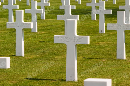 Preview: Horizontal shot of a military cemetery with white cross tombstones