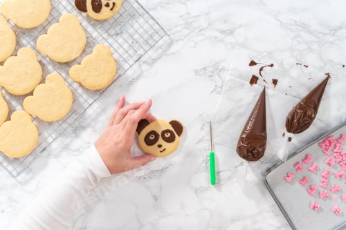 Preview: Panda shaped shortbread cookies with chocolate icing