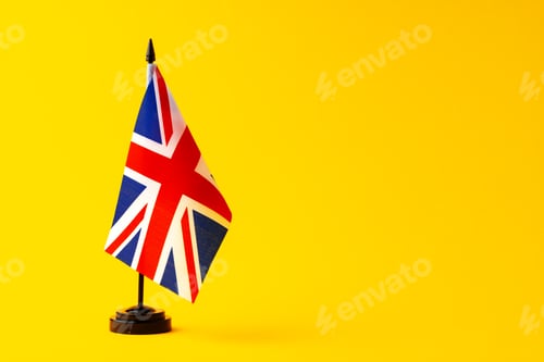 Preview: Flag of Great Britain Union Jack on flagpole studio shot