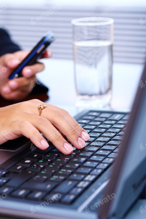 Preview: woman hands on laptop keyboard