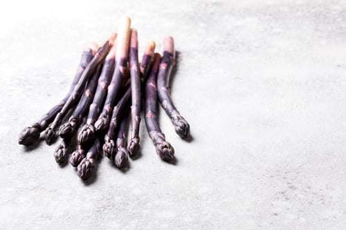 Preview: Fresh purple asparagus. Healthy eating concept. Food for vegetarians.