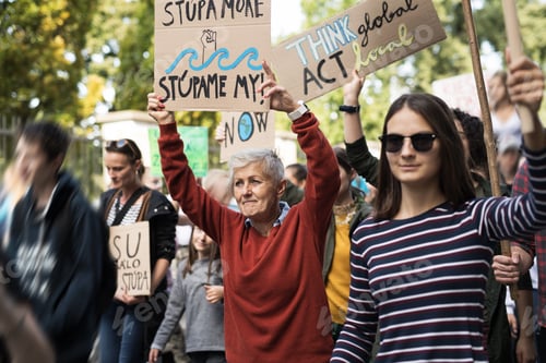 Preview: People with placards and posters on global strike for climate change