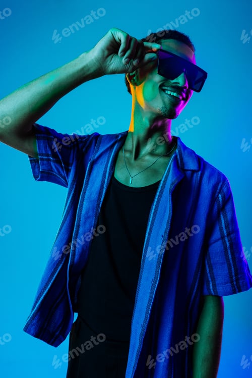 Preview: African man portrait in studio on colorful background