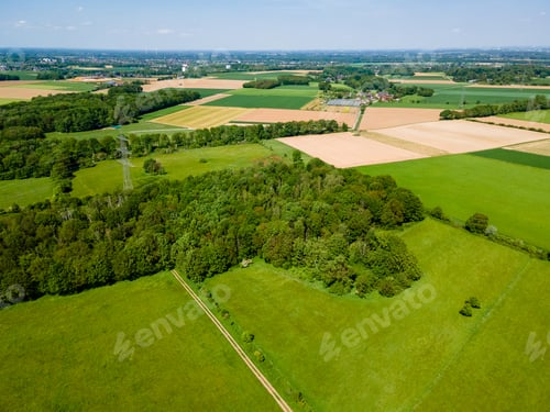 Preview: Farmland from above. Aerial view over green fields