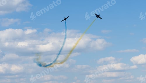 Preview: planes performing colorful trails