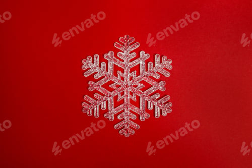 Preview: Red Christmas background with crystal snowflake. New year minimal pattern