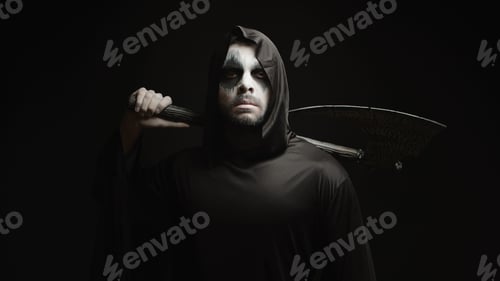 Preview: Grim reaper over black background with axe in his hands