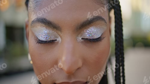 Preview: Creative makeup african woman looking camera at square portrait. Lady staring