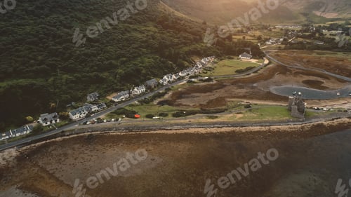 Preview: Aerial ancient castle ruins at sea. Nobody nature seascape at sun ocean bay. Buildings, cottages