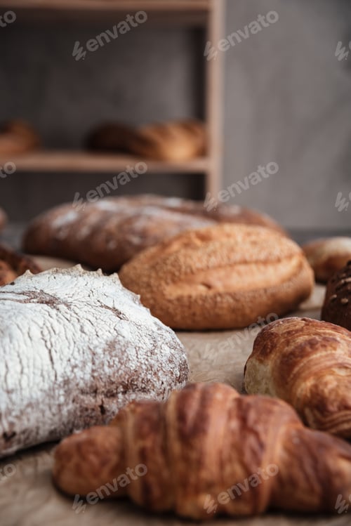 Preview: Pastries and bread with flour on table