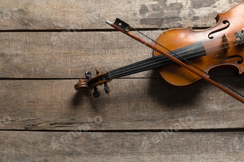 Preview: Violin on a wooden textured table