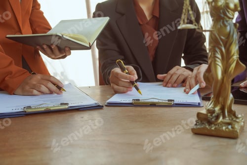 Preview: A group of lawyers and clients engage in a professional meeting law office, discussing agreements
