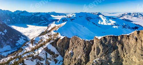 Preview: Aerial drone view of snow covered ski slopes at Stoos,Switzerland