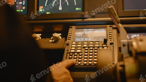 Preview: Pilot Using Aircraft Control Panel in the Cockpit