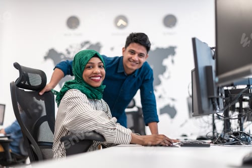 Preview: Multiethnic startup business team Arabian woman wearing a hijab on meeting in modern open plan