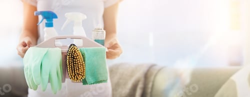 Preview: Hands, cleaning and mockup with a woman housekeeper holding a basket of detergent or disinfectant i