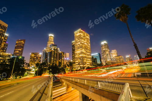 Preview: View of city skyscrapers and highway at night, Los Angeles, California, USA
