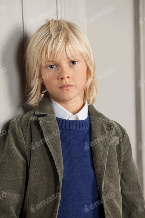 Preview: Boy leaning against door