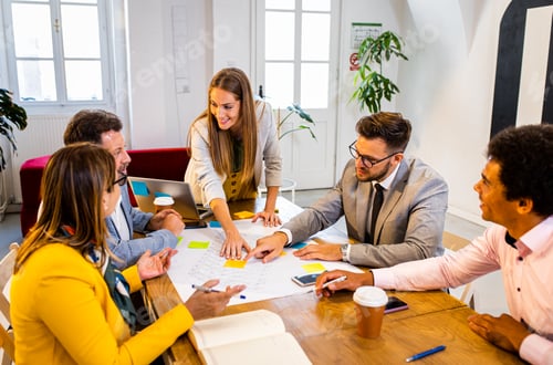 Preview: Group of business people working in office.