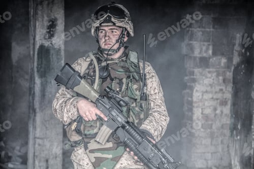 Preview: Equipped marine in combat conditions in war zone