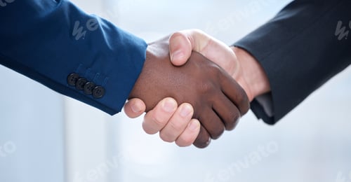 Preview: Weve got a great partnership. Shot of two unrecognizable businesspeople shaking hands at work.