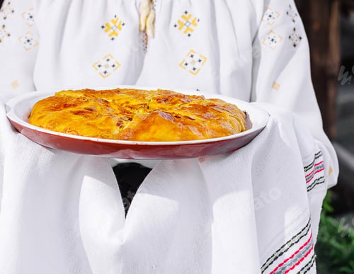 Preview: Traditional homemade bread on ethnic ceramic plate