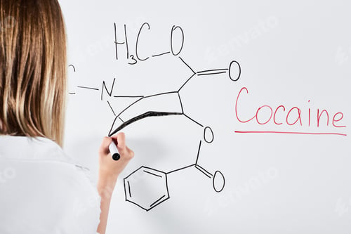 Preview: cropped view of woman writing chemical formula on white board