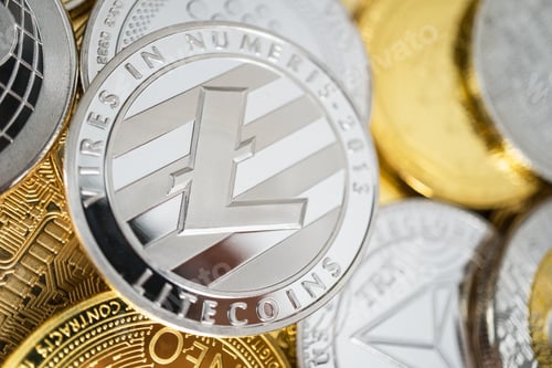 Preview: Close-Up of Litecoin Physical Coin On Stack of Many Other Cryptocurrencies