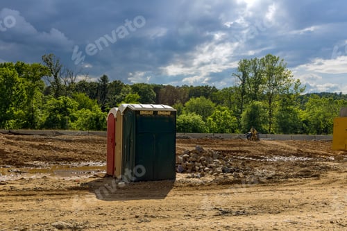 Preview: Portable outdoor restroom is located at a construction site project