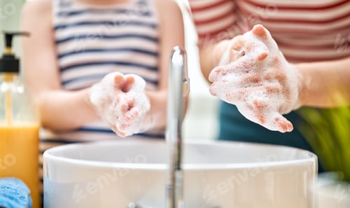 Preview: Kid and adult are washing their hands