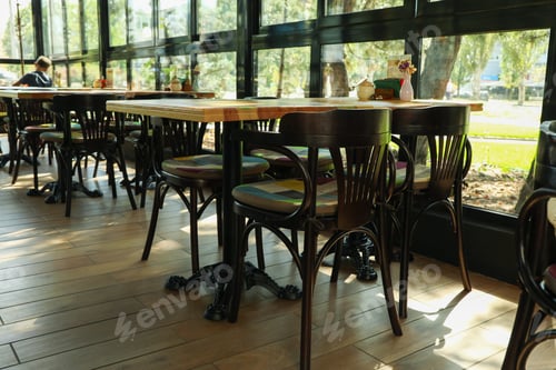 Preview: Interior of restaurant with vintage chairs and tables